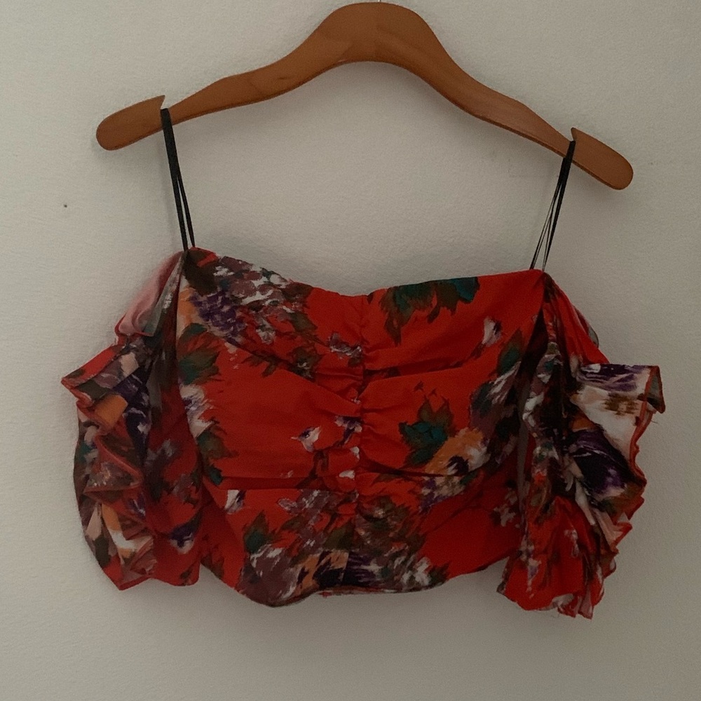 Off the shoulder ruffle sleeve crop top.